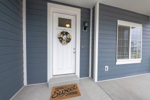 Exterior of home with pretty blue siding